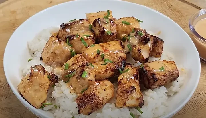 Air Fryer Spicy Salmon Bites with Avocado Lime Sauce